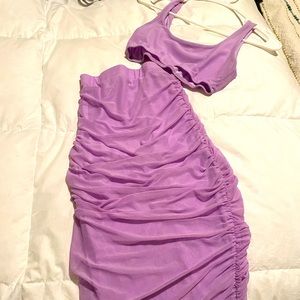 Lavender two piece with crop top and skirt.